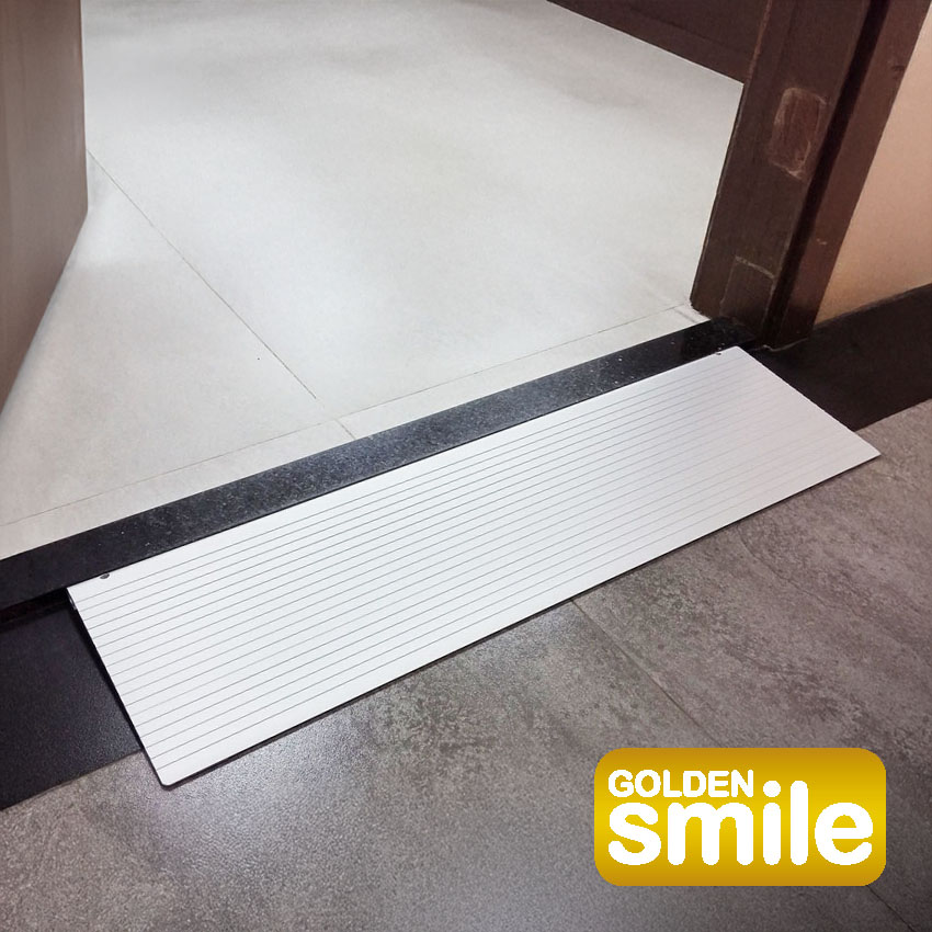 [Wheelchair King] The white ramp at the door provides a seamless transition between the two floor surfaces. The golden smile business board M03 logo is elegantly placed in the lower right corner.
